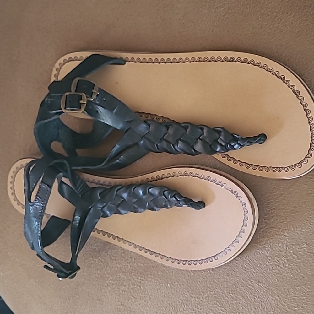 Black leather flat sandals
